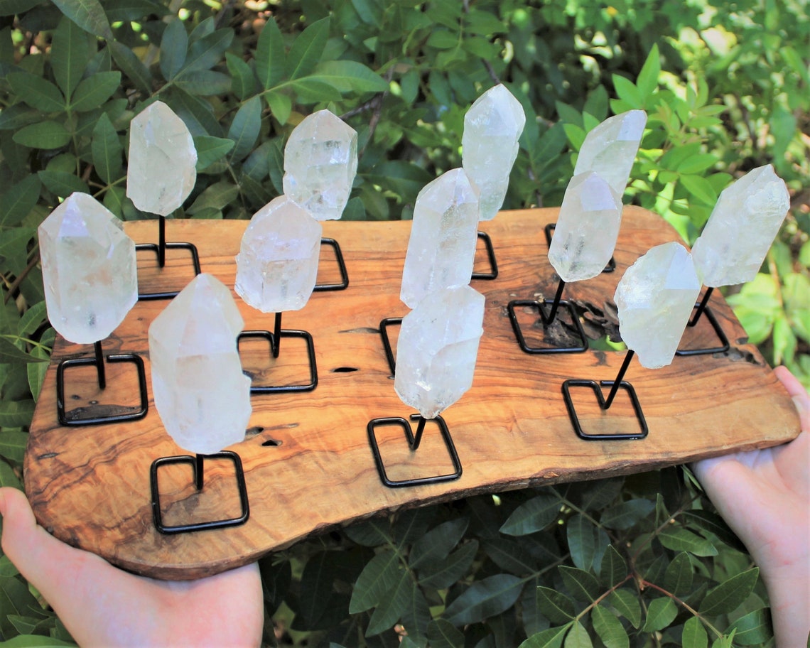 Clear Quartz Point On Metal Stand