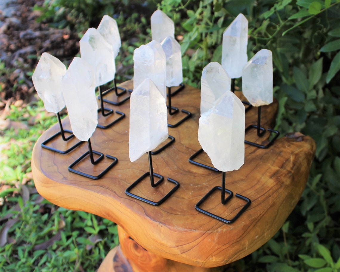 Clear Quartz Point On Metal Stand