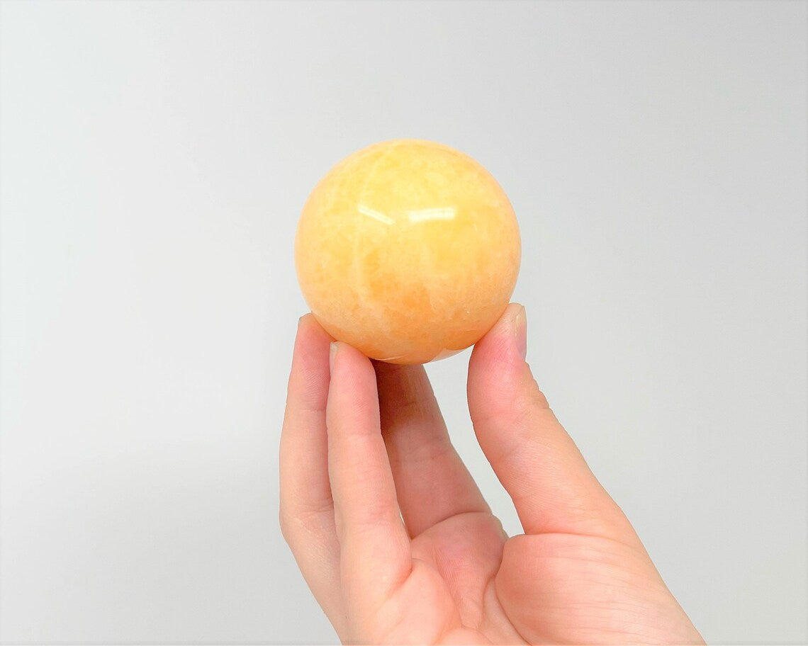 Calcite Crystal Sphere With Stand