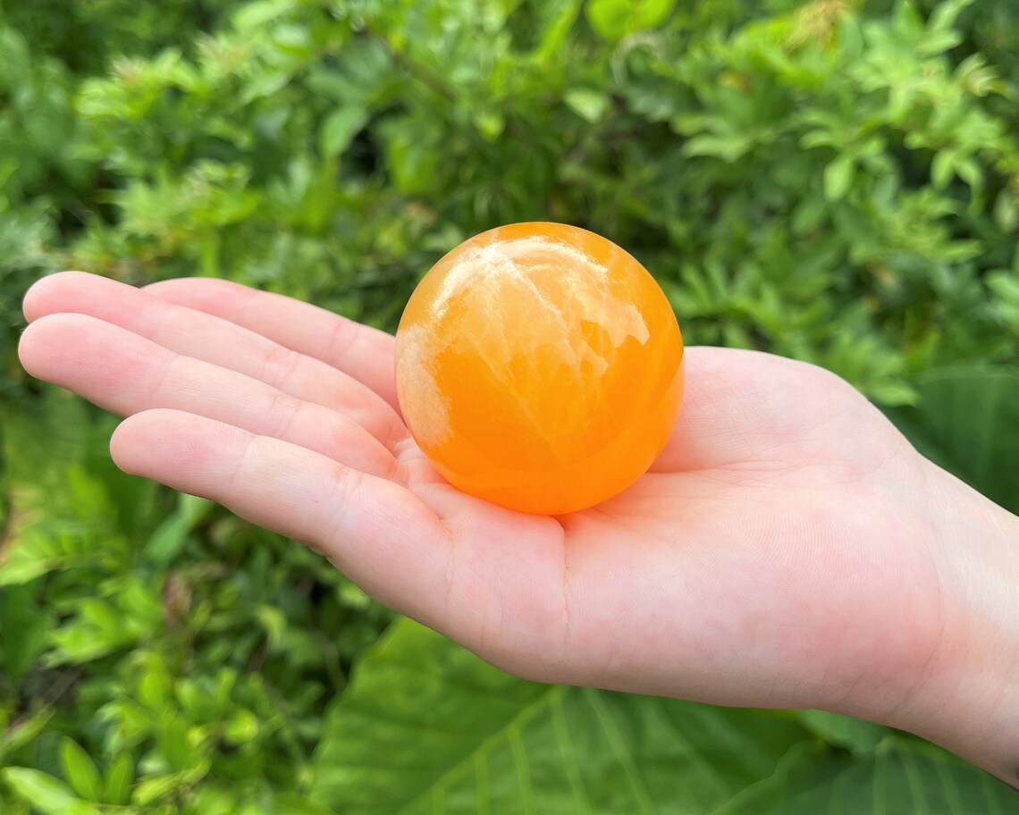 Calcite Crystal Sphere With Stand