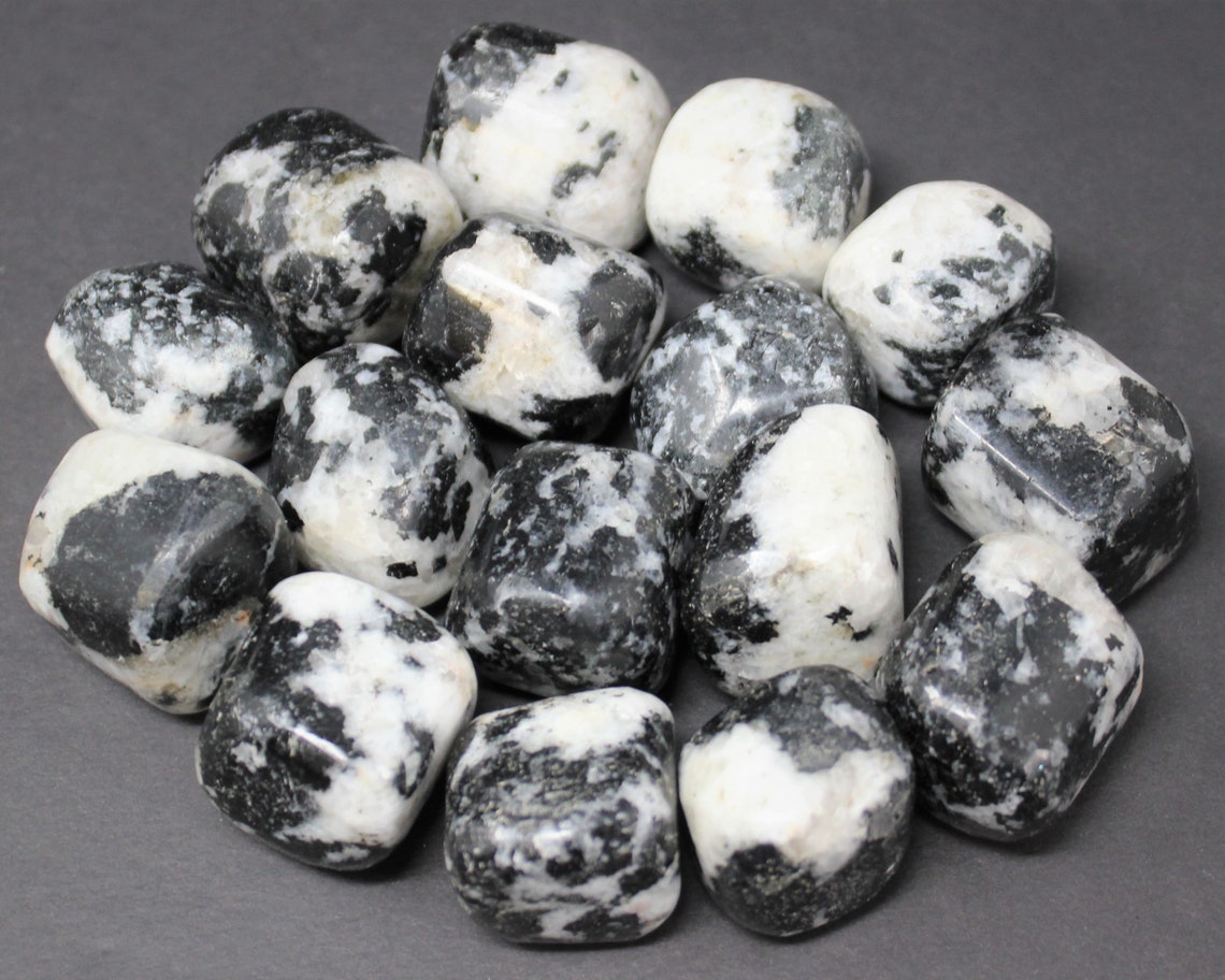 Quartz With Tourmaline Tumbled Stones
