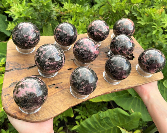 Rhodonite Crystal Sphere With Stand