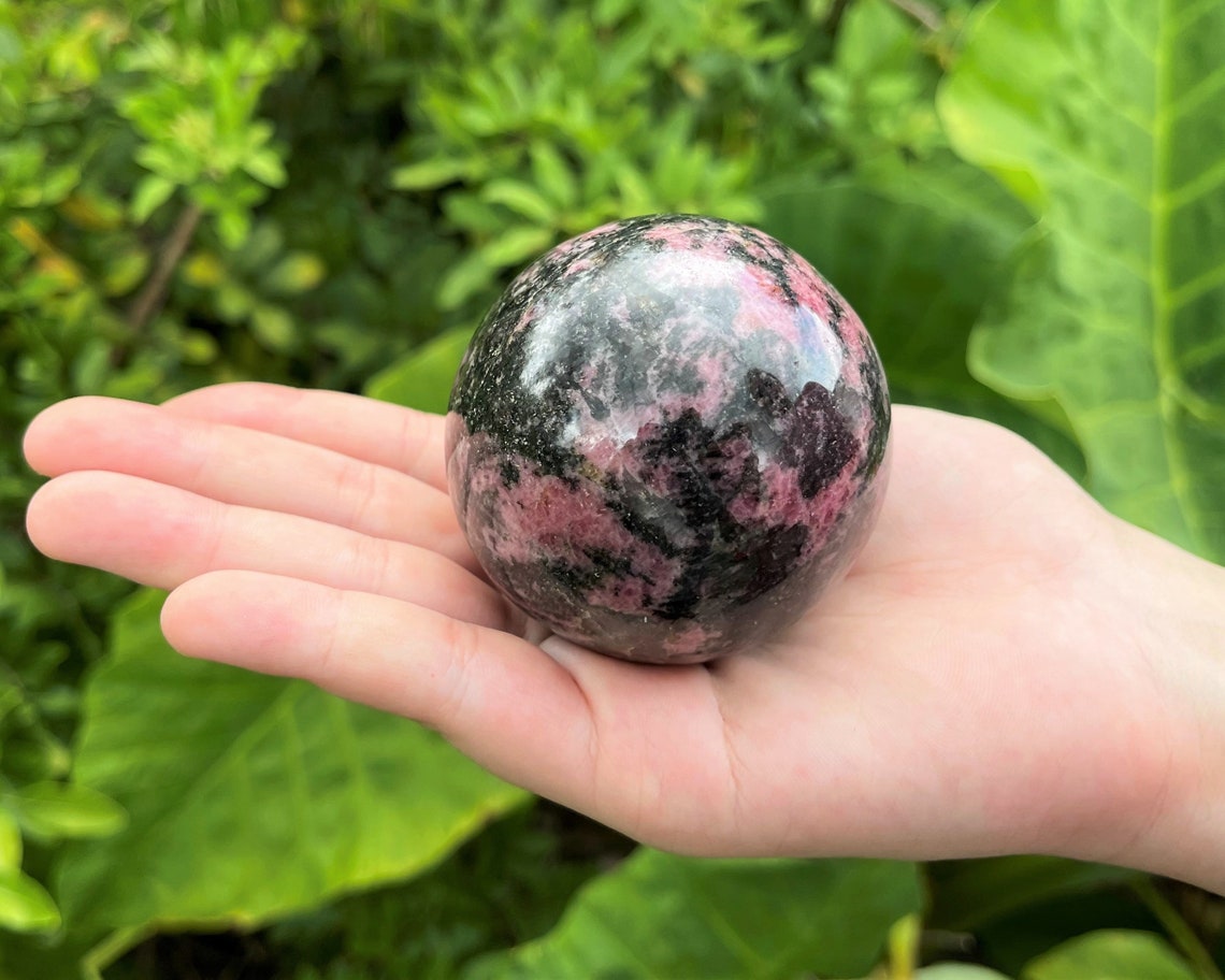 Rhodonite Crystal Sphere With Stand